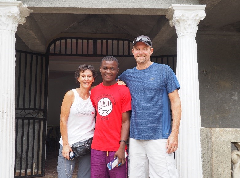Ed & Lisa Vandermeer with a young Haitian man.